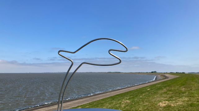 Fish sculpture on dyke. Waddenacademie.